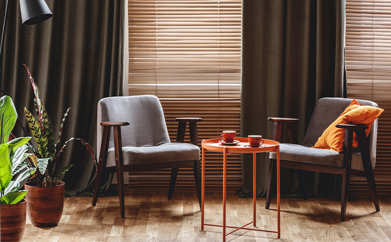 wood flooring in sitting area with Benjamin Moore Silhouette curtains